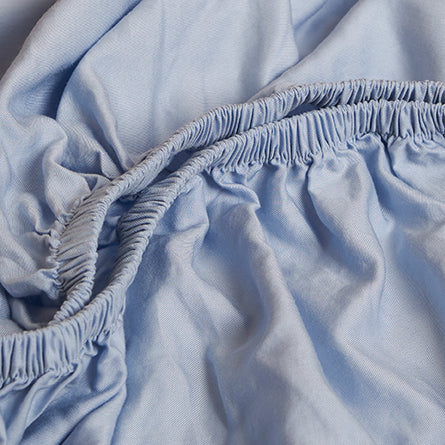 Børne kuvertlagen i TENCEL™ twill lyseblå 90x200