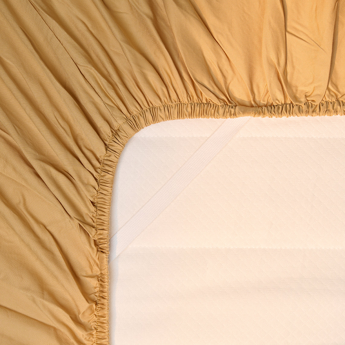 Børne kuvertlagen i TENCEL™ twill Okkergula 90x200